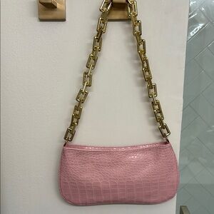 NWOT Cute Fashion shoulder bag pink color extremely light weight. No brand noted